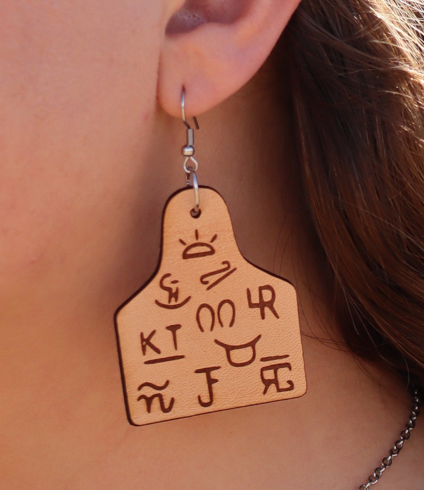 Leather cow deals tag earrings